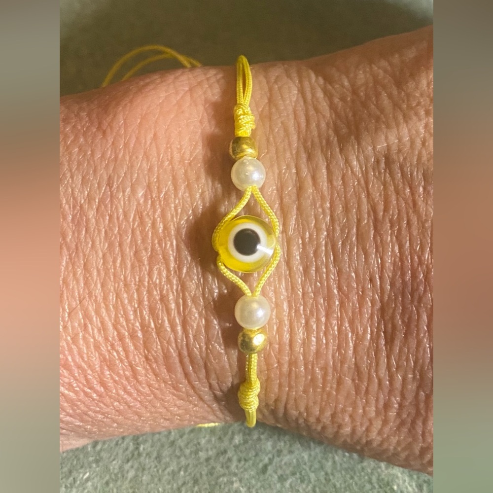 Handmade braided nylon evil eye bracelet yellow